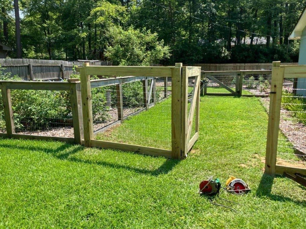 Custom wood and wire garden fence with gate