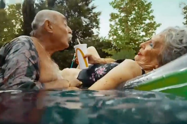 McDonald’s commercial still with a McDonald’s cup in a pool